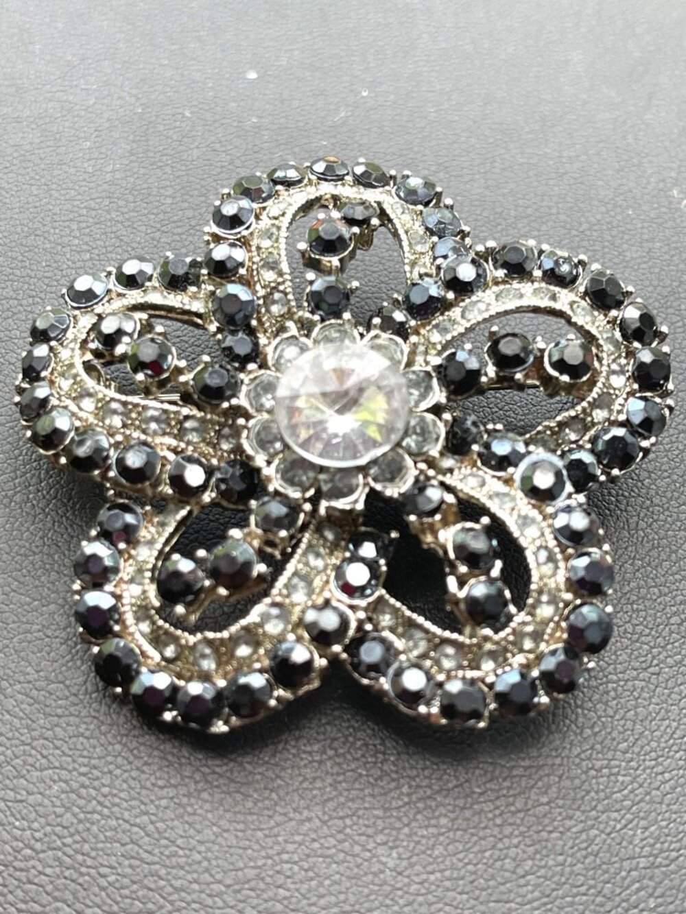 Vintage Rhinestone Glass Flower Brooch With Black & Clear Accents 2 Inches Flora